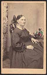 Carte de visite, Woman sitting with Colored Flowers