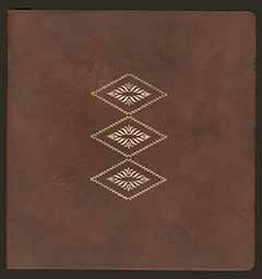 Leather-bound front cover of St. Michael's Day Nursery photograph album