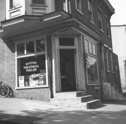 Exterior view of Burton's Tonsorial Parlor at 801 Walnut St., Wilmington, Delaware, March 1938