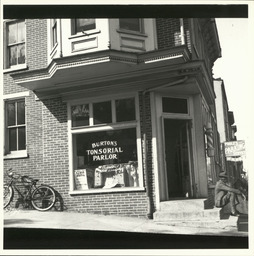 Exterior view of Burton's Tonsorial Parlor at 801 Walnut St., Wilmington, Delaware, March 1938.