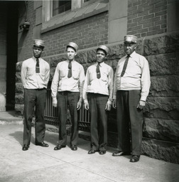 Porters at Pennsylvania Railroad Station, Wilmington, Delaware, ca. 1938-40.