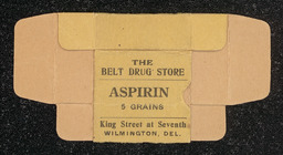 Yellowed Aspirin pill packet sold at the Belt Drug Store in Wilmington, Delaware.