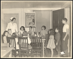 Children at dining table, undated