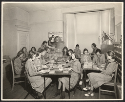 Girl Scouts assembling Christmas seals, 1937