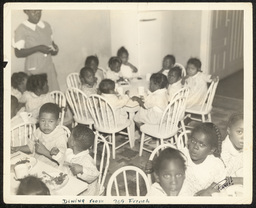 Children eating in dining room at 709 French St. location of St. Michael's prior to 1950.
