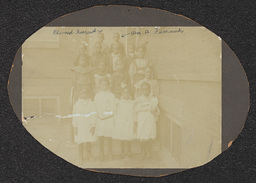 A mounted photograph of a class of children. William H. Furrowh and his younger brother Elwood are noted as standing in the very back row.