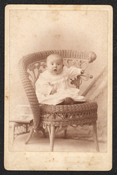 Cabinet Card, Baby sitting on a Wicker Chair
