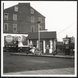 Exterior view of White's Quick Service Station, Feb 23, 1938