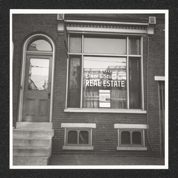 An exterior windowfront view of Elmer E. Stubbs Inc. Real Estate