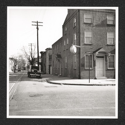 Exterior view of the Charles H. Gray Funeral Home, looking along 8th St.