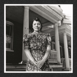 Mrs. Alberta Russell Williams poses near front steps of her workplace, the YWCA