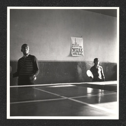 Two boys playing ping pong at the Garrett Settlement House. During the Depression, settlement houses such as these provided families with food and shelter and acted as orphanages.