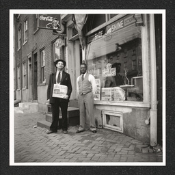 Vernon - Newspaper Salesman Philadelphia Afro-American, two men outside shop