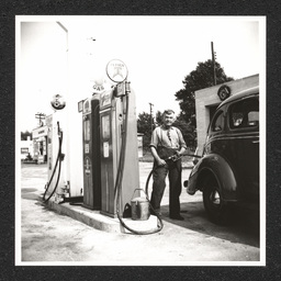 Texaco gas station, man pumping gas, 1940