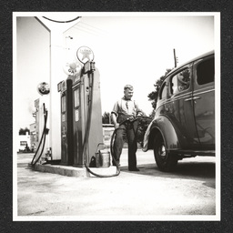 Texaco gas station, man pumping gas, 1940