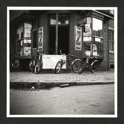 Kids' Shop 9th Lombard St., bicycles outside store, 1938-40