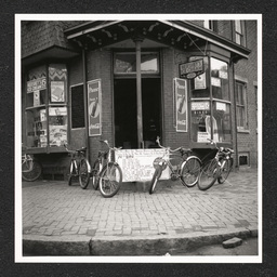 Kids' Shop 9th Lombard St., bicycles outside store, 1938-40