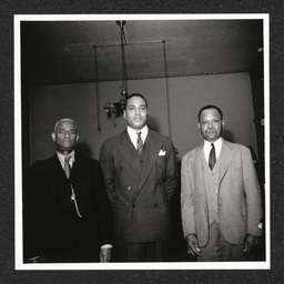 Johnson's Liquor Store 528 Lombard St., three men pose, 1940