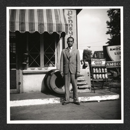 Barnett Bros. Gas Station Chester PA, John Barnett poses, 1940