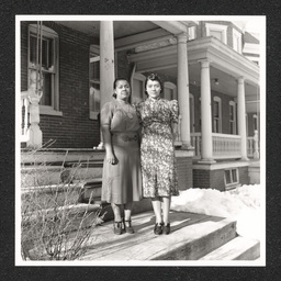 Mrs. Helen Mosley and Mrs. Alberta Russell Williams, posing on front steps of YWCA, January 1, 1939