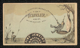 Trade Card printed for J. Clayton Massey, a jeweler and watchmaker in Wilmington, Delaware. The design on the front of the card shows a man sitting inside an open pocket watch, fishing. The name and address of the business is centered in text. An advertisement for one of Massey's watch cases is printed on the back of the card.
