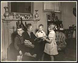 Miss Bissell with three children from Sunnybrook Cottage, undated