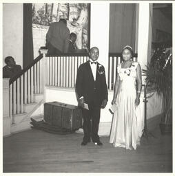 Couple poses at charity ball, May 1939