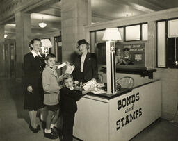 Buying war bonds and stamps, ca. 1945