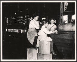 Daisy Langford, 8 years old, works on Ross's Canneries in Seaford, Del. Photo by Lewis W. Hine. Copied from the National Archives.