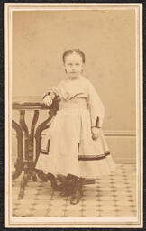 Carte de visite, Young Girl Posing with Table, front
