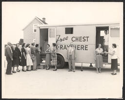 Gelatin silver print, Patients lining up at a free chest x-ray bus, undated