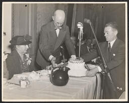 Presenting cake at the Christmas seal 40th Anniversary Party, 1947