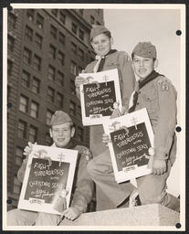 Boy Scouts with Christmas seal posters, undated