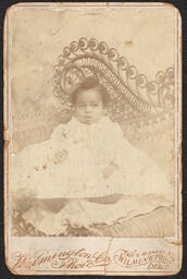 Cabinet card, Portrait of a baby wearing a white dress, front