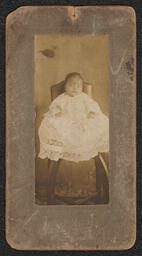 Photograph, Baby wearing a lace dress