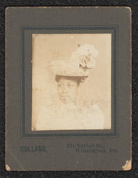 Photograph, Woman wearing feathered hat