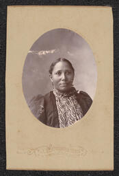 Photograph, woman wearing a patterned shirt