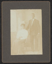 Photograph, Standing man and seated woman
