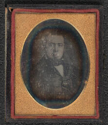 One of two identical daguerreotypes of the same man (the better copy of the two). Information obtained at time of accession provisionally identified the subject as Thomas Garrett's brother Benjamin, but given the chronology that attribution seems unlikely. The photograph perhaps depicts Ellwood's half-brother Eli.