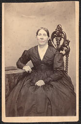 Carte de visite, Seated Woman in Black Dress with Book, front