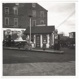 Exterior view of White's Quick Service Station, 828 Walnut St., Wilmington, February 23, 1938.