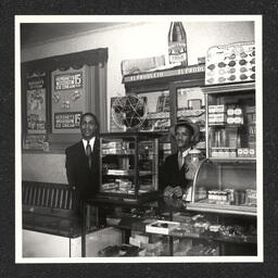 Kids' Shop 9th Lombard St., owners poses inside store, 1938-40